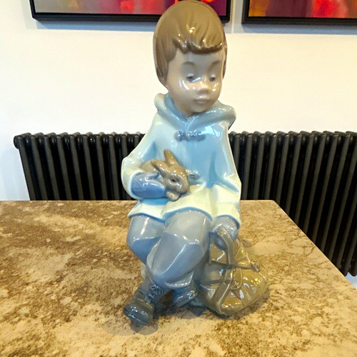 Nao porcelain seated boy - porcelain,