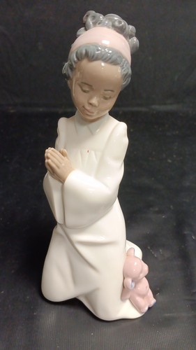 Lladro child with teddy bear - child,