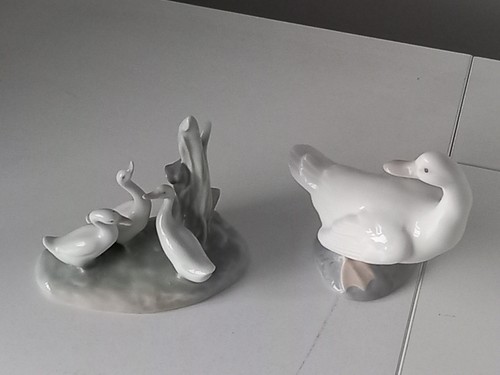 Nao lladro figurines - by,