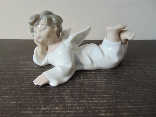 Lladro reclining boy angel - lladro,