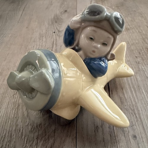 Nao lladro and - by,