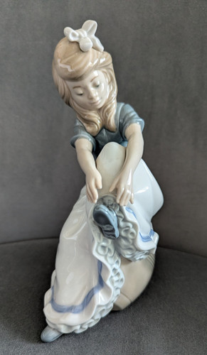 Lladro nao girl tying my - lladro,