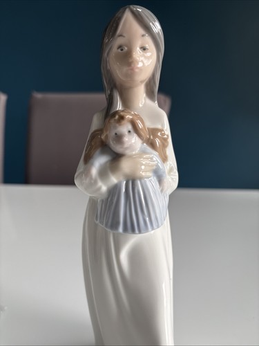 Nao lladro porcelain - by,