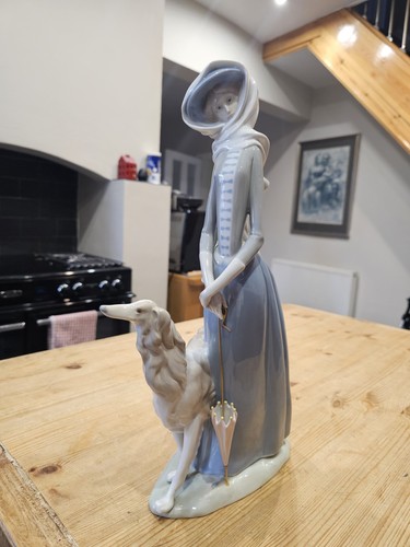 Lladro lady with greyhound - with,